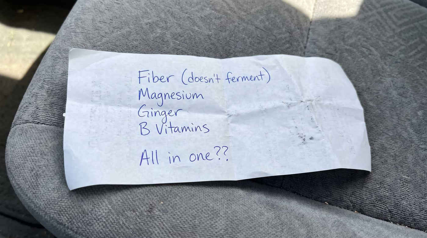 Handwritten list on the back of a pharmacy receipt